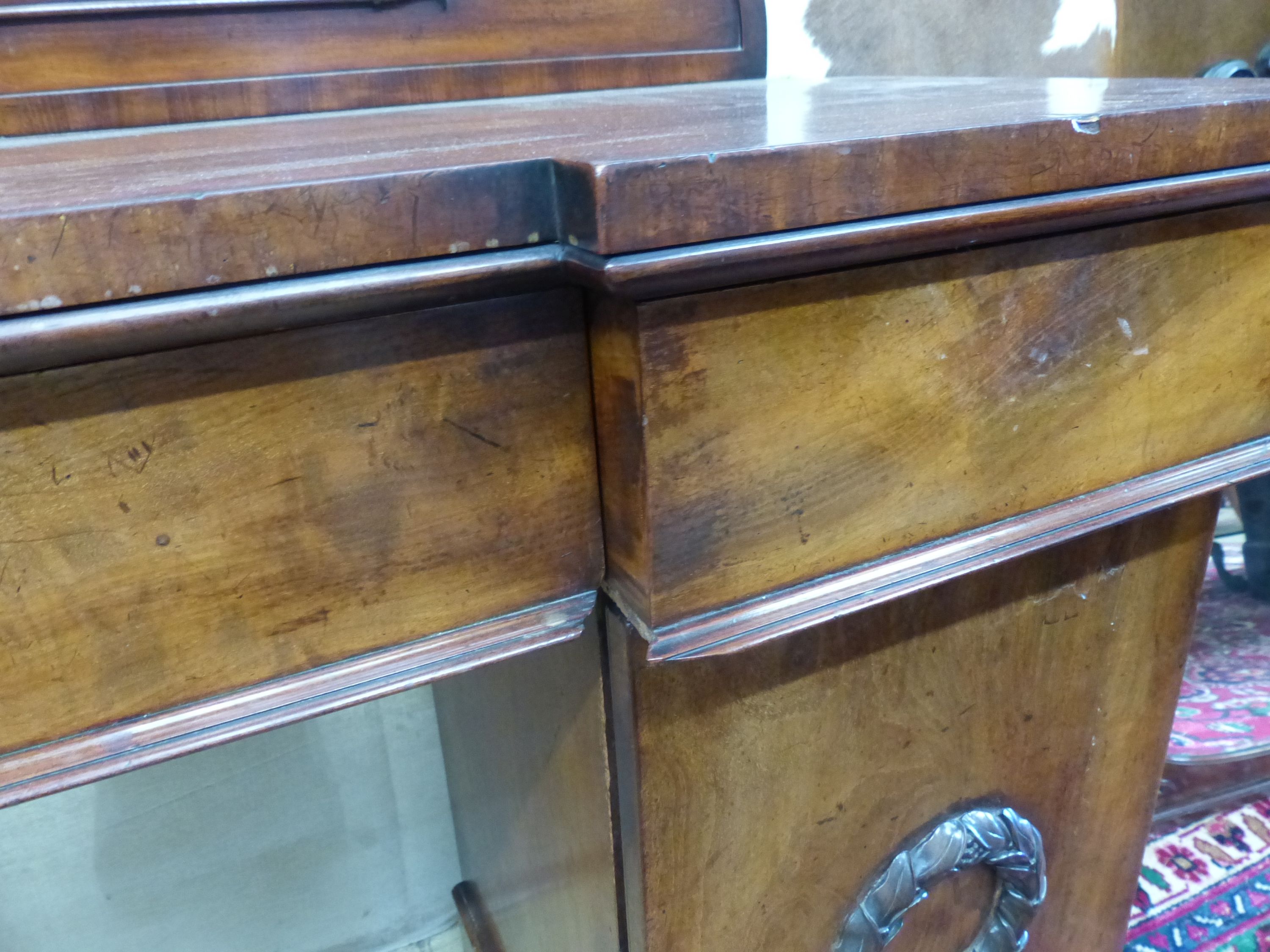 A Victorian mahogany break front pedestal sideboard, length 184cm, depth 56cm, height 125cm.